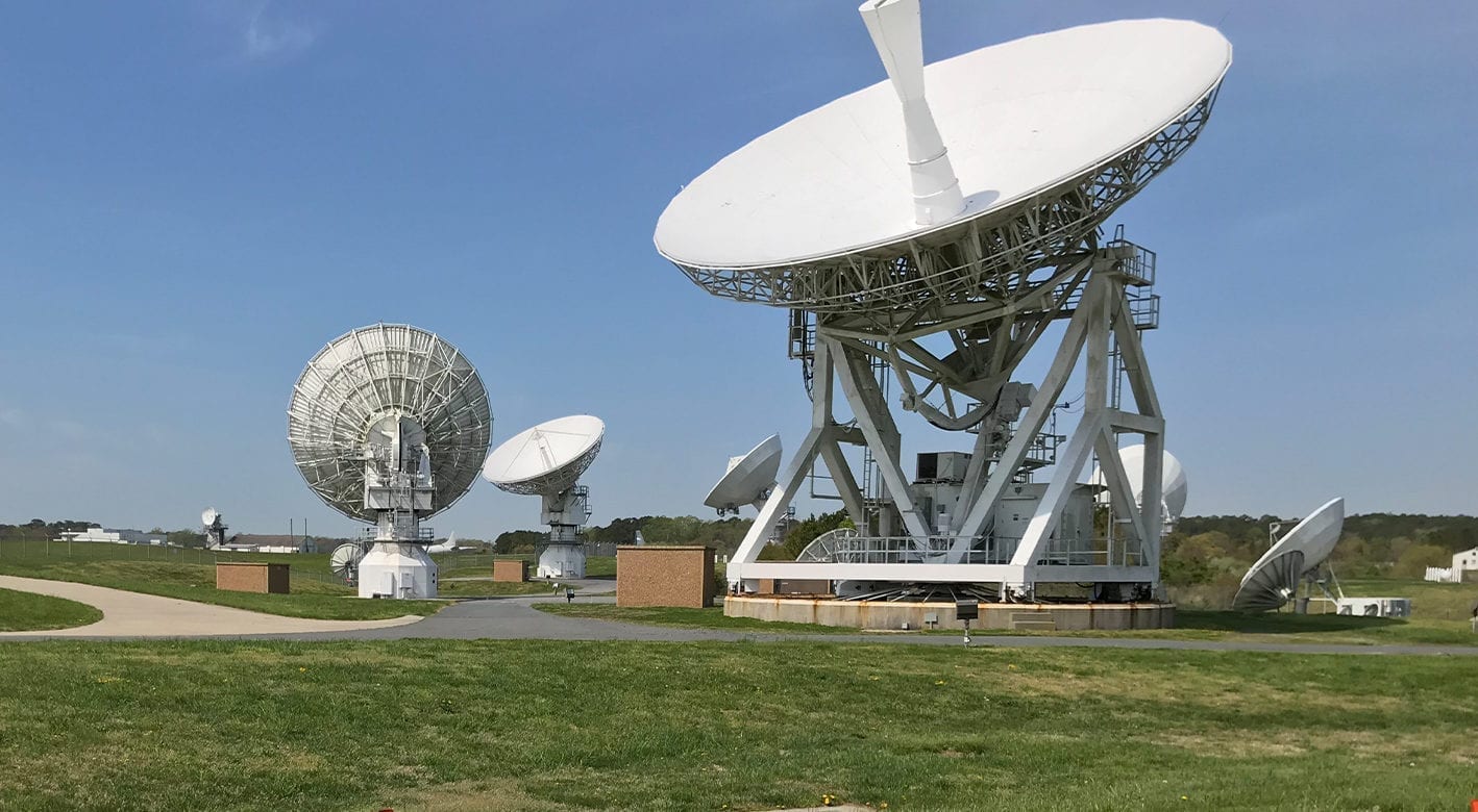 Easi-Set buildings next to large communications dishes