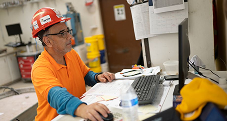 Smith midland associate working on a computer