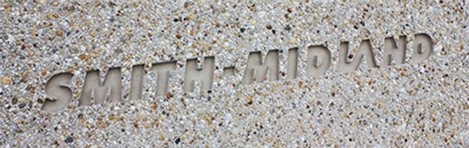 Smith Midland logo set in precast concrete
